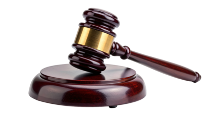 A glossy wooden gavel with a gold band rests on its matching circular base