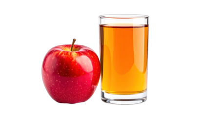 A crisp red fruit and a tall glass of amber liquid, against a black backdrop
