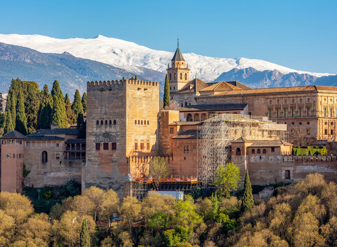 Alhambra complex with Sierra Nevada mountains at background, Granada, Spain