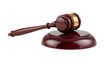 Gavel on sound block in dark wood with gold band in formal courtroom setting for law and justice themes