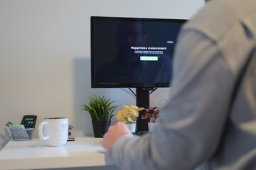 Middle Aged Man Takes Happiness Assessment for Emotional Intelligence and Mental Health Awareness and Wellness Metrics Concept