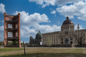 Berliner Stadtschloss and Fernsehturm Skyline - The reconstructed Berliner Stadtschloss (Humboldt Forum) dome against the modern Fernsehturm, showcasing the city's historical and contemporary blend.
