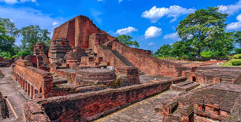 Nalanda University ruins in Bihar reveal a vast ancient learning center, founded in the 5th century CE, famed for monasteries, libraries, and global Buddhist scholars.