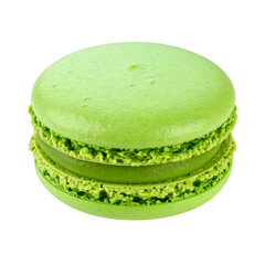 A vibrant, close-up shot of a pistachio-green macaron against a black background