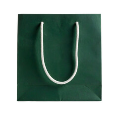 Overhead square shot of a dark green shopping bag with a white rope handle, set on black