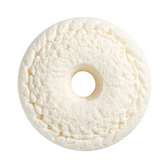 Isolated overhead view of a textured, off-white, donut-shaped food item with a central hole