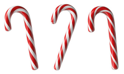 Three red and white candy canes on black striped Christmas isolated on a transparent background