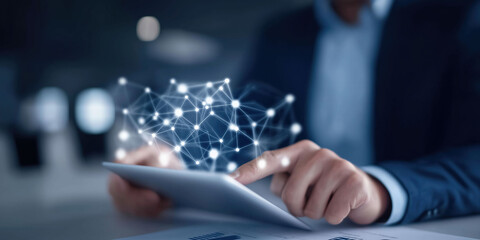 Professional businessman interacts with advanced digital network interface utilizing modern tablet technology effectively.