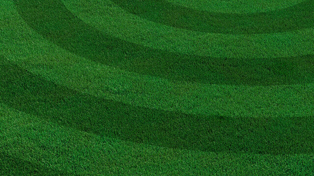 Green grass texture background. A perfectly manicured Sports field / Pitch / Garden Lawn wallpaper with circular stripes.
