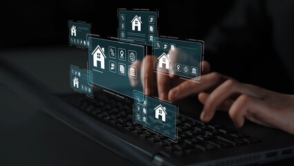 Modern technology concept with hands using laptop keyboard and holographic screens showcasing home icons and user interface elements for real estate and smart home applications Gluon.