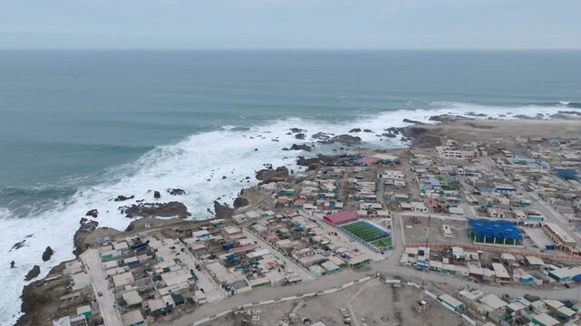 Aerial of a Fishing village on a peninsula in Peru