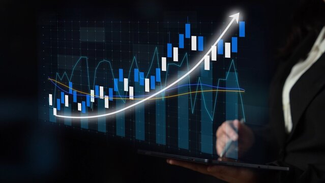 A business professional works on a digital tablet, analyzing stock market data displayed in charts and graphs, indicating growth trends in a modern workspace. Copula - Powered by Adobe