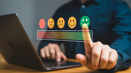 Person selects a happy green face icon from a satisfaction scale on a digital interface, indicating excellent customer feedback.png