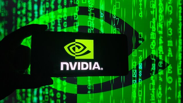 Nvidia logo displayed on a smartphone with a binary code background, New York City, 21 November 2025