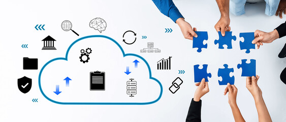 Diverse team members connect puzzle pieces in a cloud environment, symbolizing collaboration and innovative solutions in data management and technology integration. Trope