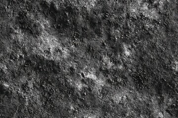 Rough Granite Texture: This close-up view of textured granite showcases a beautiful blend of light and shadow, revealing the raw, natural essence and weathered appearance. 