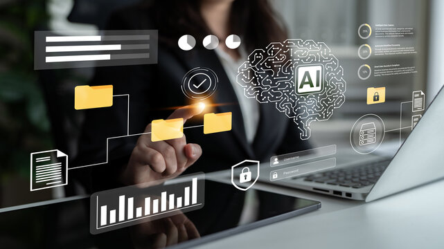 A business professional interacts with advanced technology and artificial intelligence concepts in a modern office, showcasing innovative digital graphics and data analysis. Gantry - Powered by Adobe