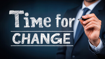 Message on a board that says time for change with a person holding a marker in a formal setting