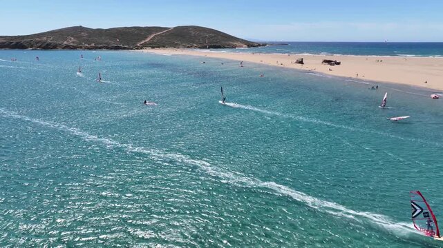 Aerial drone cineamatic video of paradise two sided beach of Prasonisi ideal for wind and kite surfing in Southeast part of Rhodes island, Dodecanese, Greece