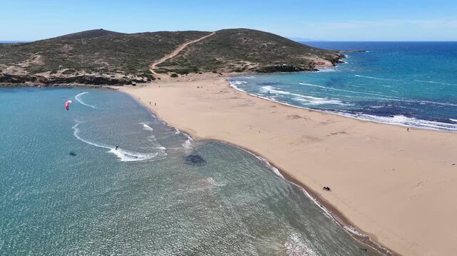 Aerial drone cineamatic video of paradise two sided beach of Prasonisi ideal for wind and kite surfing in Southeast part of Rhodes island, Dodecanese, Greece