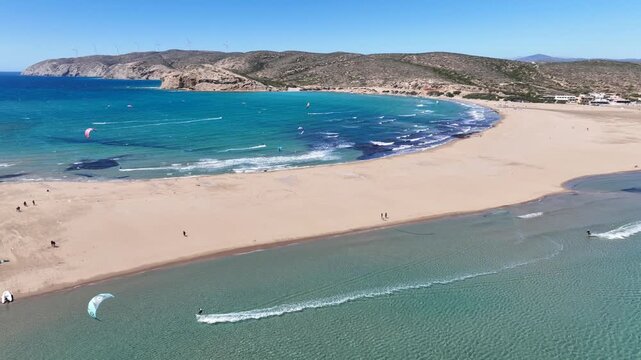 Aerial drone cineamatic video of paradise two sided beach of Prasonisi ideal for wind and kite surfing in Southeast part of Rhodes island, Dodecanese, Greece