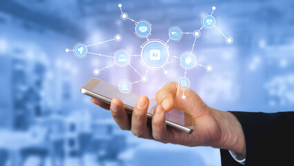 A hand holding a smartphone displays various icons representing artificial intelligence and interconnected technology networks, illustrating modern innovation. Tessel
