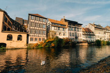 Obraz premium Strasbourg, France - September 5, 2025 Old town water canal of Strasbourg, Alsace, France. Traditional half timbered houses of Petite France