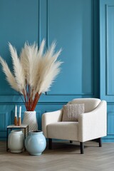 Elegant room interior pampas grass armchair and decor against a blue wall