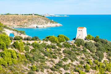 Scenic view of the Adriatic coast with Torre di San Felice overlooking turquoise waters near Vieste, Apulia, Italy