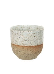 Handmade ceramic cup with speckled glaze, two-tone beige and white design. Minimalist stoneware mug isolated on white background.