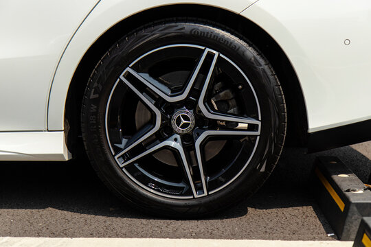 April 10, 2021, Seoul, South Korea - Close-up of a white Mercedes-Benz CLA 250 car wheel with AMG rim and Continental tire