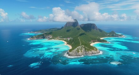 Aerial view of a lush green island with dramatic peaks, sandy shores, and crystal-clear water