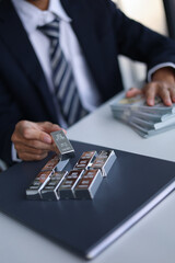Silver bars on the table. Silver Trading Businessman invest in trading silver, calculating profit price of  buying and selling silver in the market.