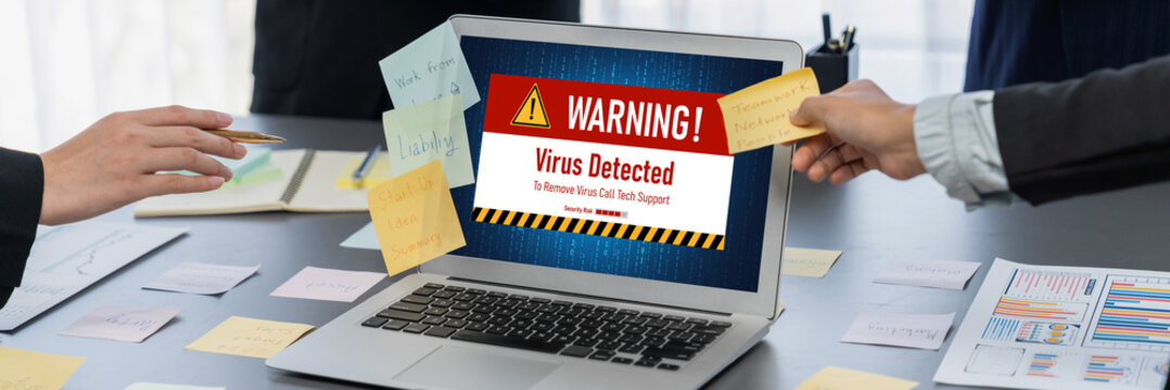 Virus warning alert on computer screen detected brisk cyber threat , hacker, computer virus and malware - Powered by Adobe