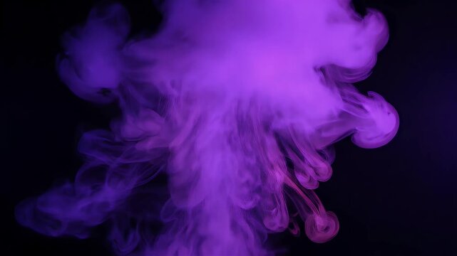 Vibrant purple smoke billows and swirls against a dark background, creating an abstract and ethereal visual effect.