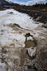 Snow melting in spring in Alaska