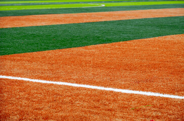 sports field with a surface of synthetic fibers made to look like natural grass Freshly Cut with...