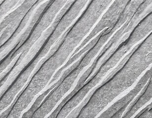 light gray textured surface resembling stone or paper with a rough uneven and diagonal pattern