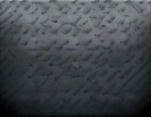 abstract grayscale pattern of small repeating shapes creating a textured subtle gradient effect from dark to light