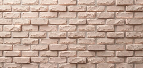 Fototapeta premium Pale pink brick wall texture. Natural sandstone tiles form a seamless facade pattern. Rough, earthy material used for architecture and design.