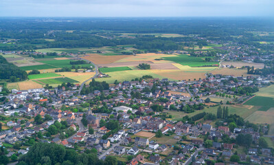 Fototapeta premium aerial view of village and farm field near Brussels