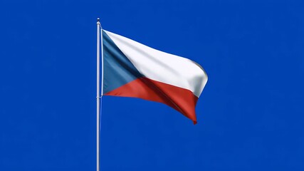 Czech Republic flag waving proudly in the wind against a vibrant blue sky, a symbol of national pride and identity in motion