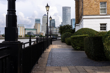 Riverside Walkway in Canary Wharf development with Modern London City Skyline