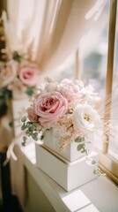 Elegant Wedding Floral Arrangement with Pink Roses and White Hydrangeas in White Box on Windowsill in Soft Natural Light