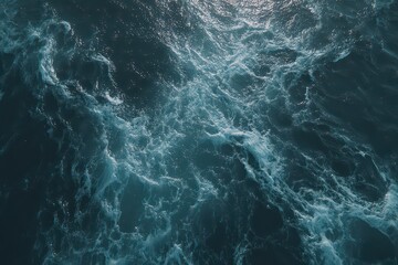 Obraz premium Sparkling Turquoise Ocean Surface Water with Dynamic Wave Patterns Abstract Seascape Texture Reflecting Sunlight in Marine Environment Detailed Aerial View