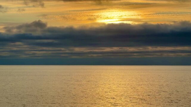 Golden Sunset on the Atlantic Ocean with Waves at Chatham, Cape Cod