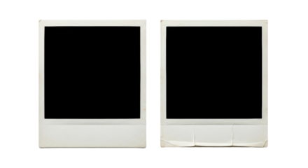 Two blank vintage instant camera photo prints with textured aged borders and dark centers, one with creases, on a transparent background with copy space, concept of nostalgia and potential
