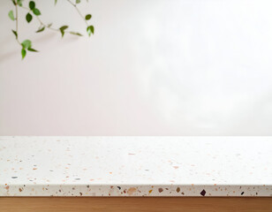 A clean, modern countertop with a speckled surface in a soft, neutral environment. Ideal for concepts like home decor, minimalist design, and interior styling.