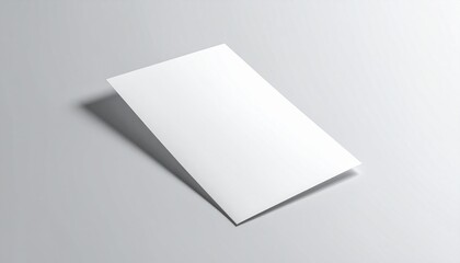 Blank white folded paper card or brochure mockup on a light grey background with a soft shadow