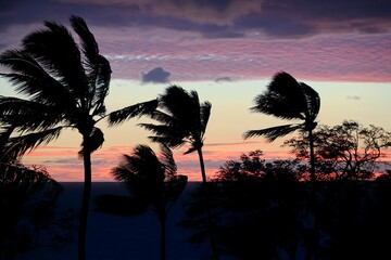 The sun sets on Kihei on the island of Maui